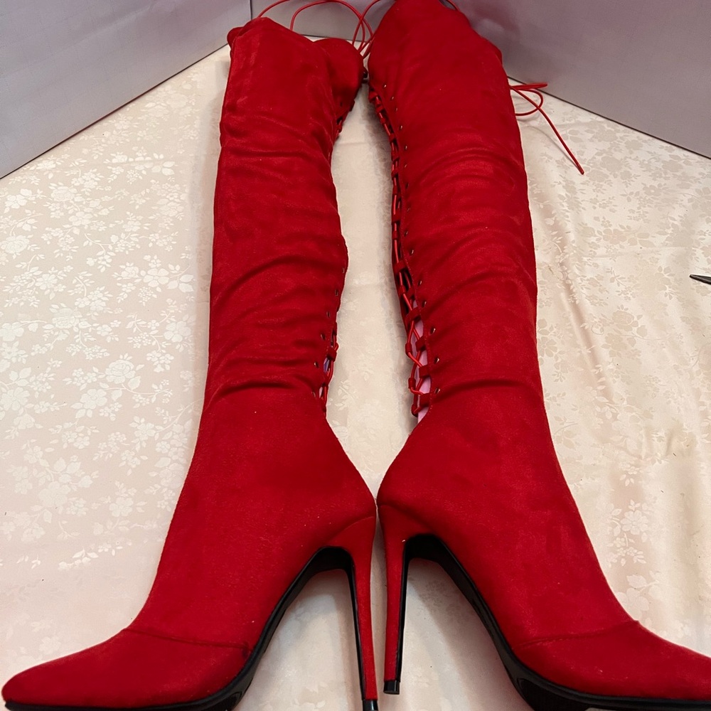 Women’s red suede like material sz 7.5 with a 4” heel. - Picture 7 of 10